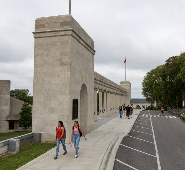 Students walk past the Western Kentucky University Colonnades on their way to class.
