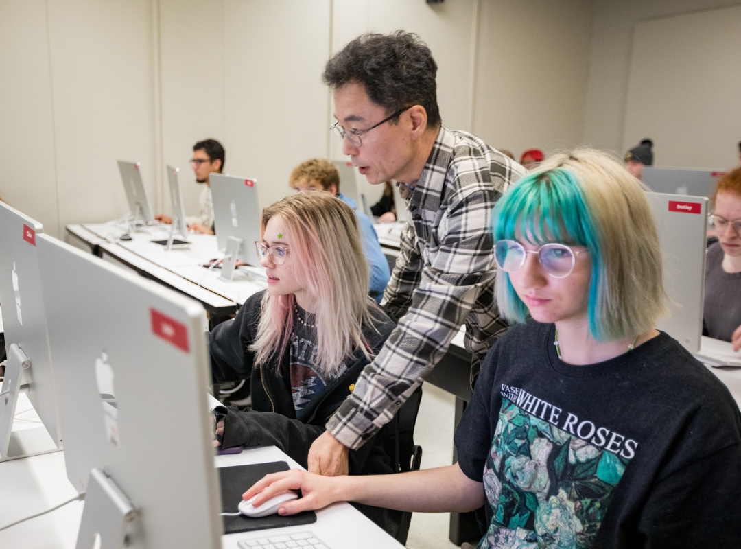 students learning from professor