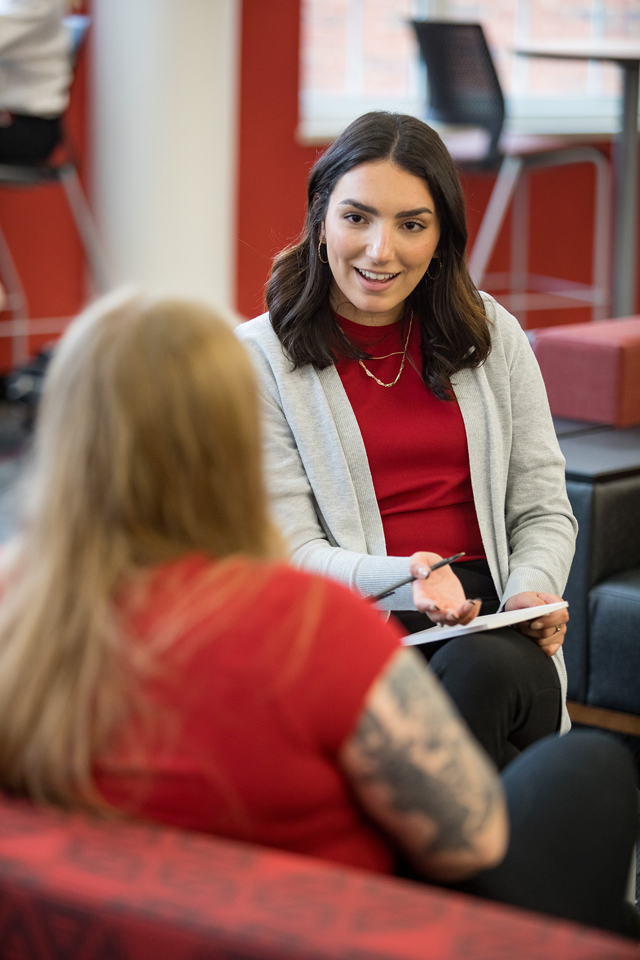 Three students working in the student success center.
