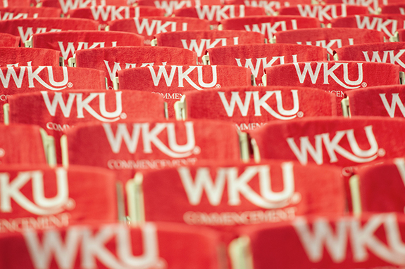 WKU red towels placed on white chairs for graduation day