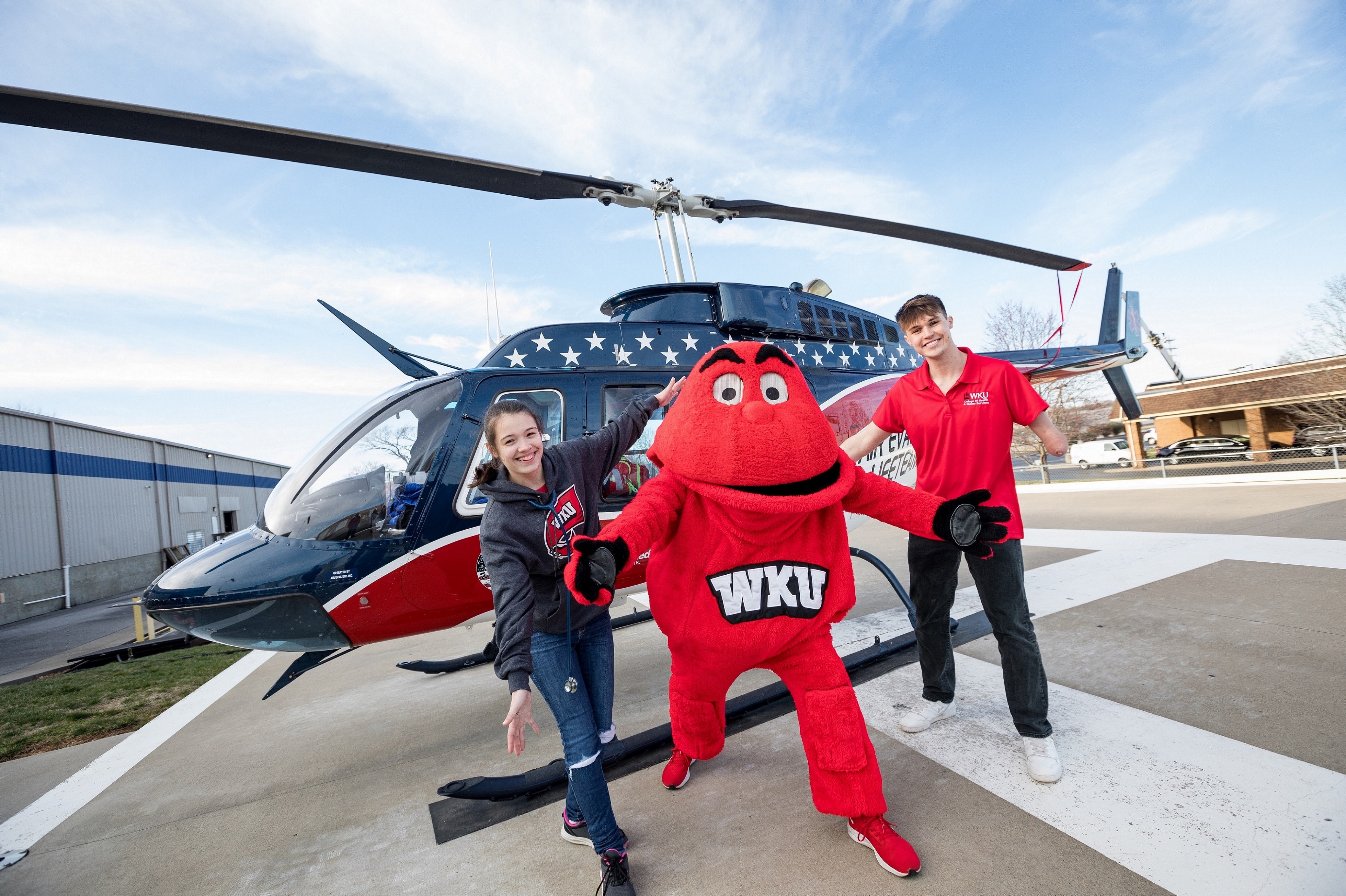 Big Red Airvac Keenan and Riley Big Red with Students by Helicopter