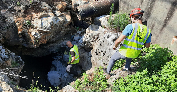Students Walking Down Rocks
