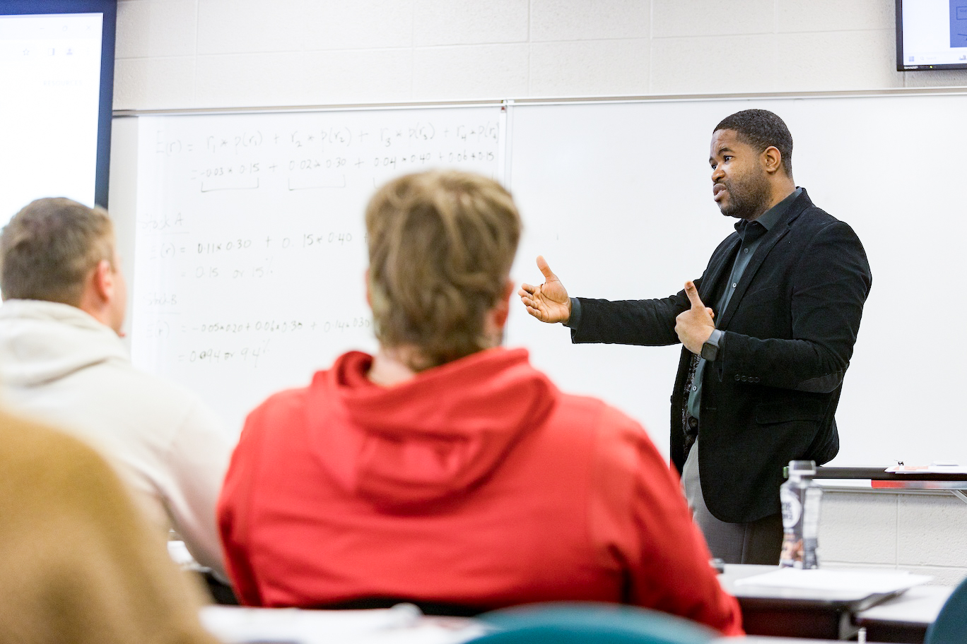 Western Kentucky University Finance professor teaches students in class.