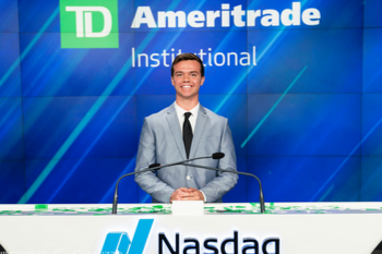 Seth Newby sitting at a desk.