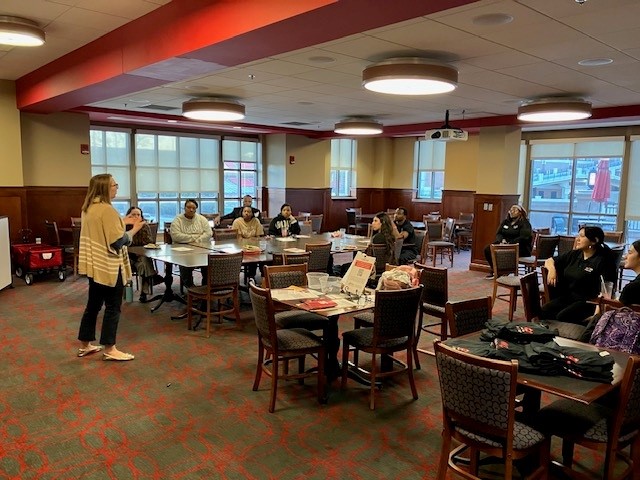 Alumnus Amber Frye and Attendees