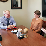 Associate Provost for Global Learning, John Sunnyguard, with the 2019 QatarDebate team: Noah Stevens, Keightley Dudgeon, Kassidy Orrender