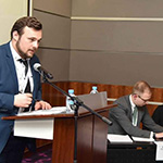 The 2019 QatarDebate team debating the team from Poland