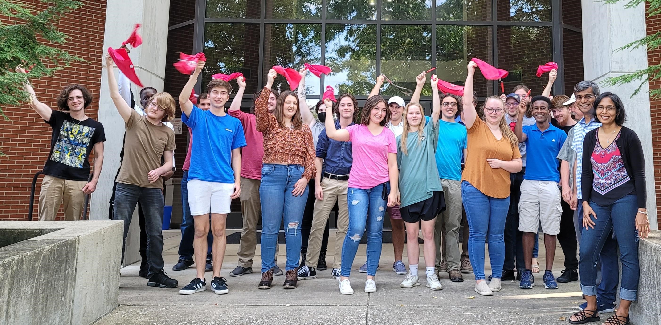 Geology Department Waving Red Towels