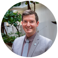 image of man wearing a gray jacket