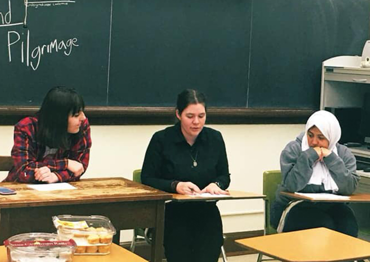 Women speaking on a panel