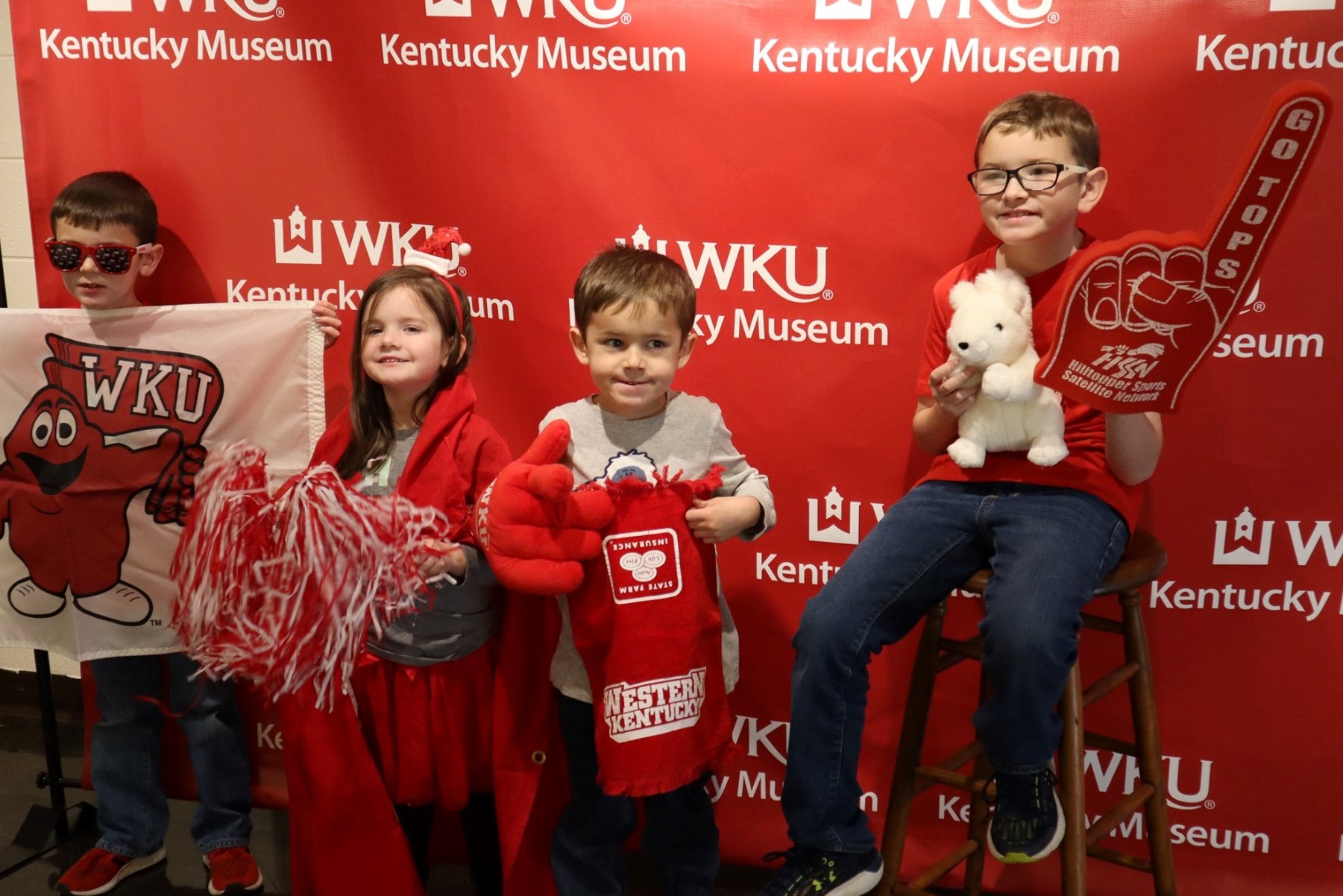 kids in front of backdrop