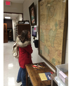 Student looking at 1877 Map of Warren County Student looking at 1877 Map of Warren County