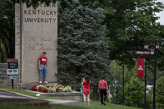Students taking pictures at the WKU Pylon
