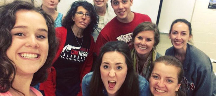 Group photo of happy students.