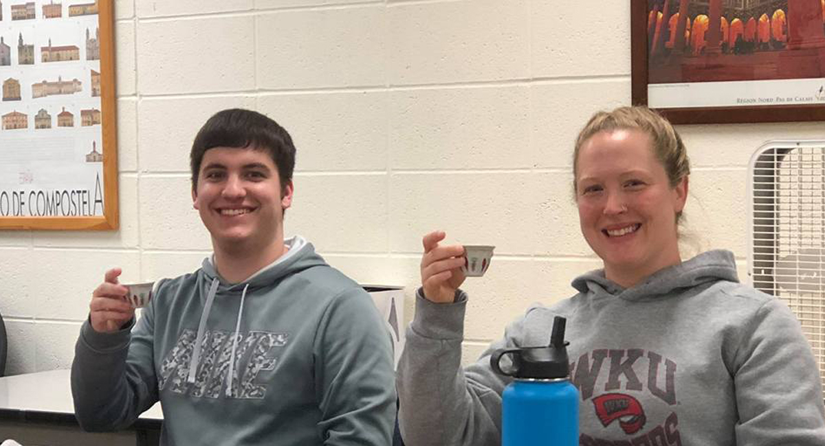 Two students drinkng tea.
