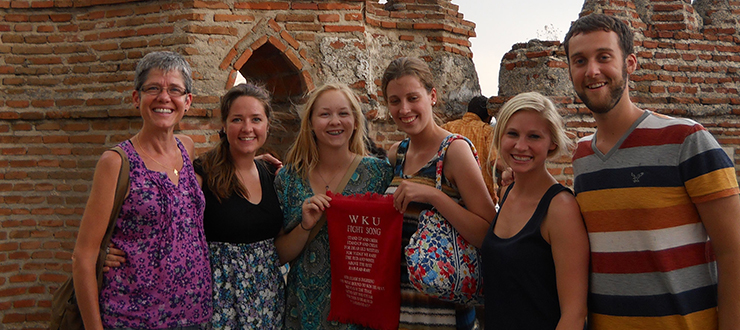Student visiting ruins in Spain.
