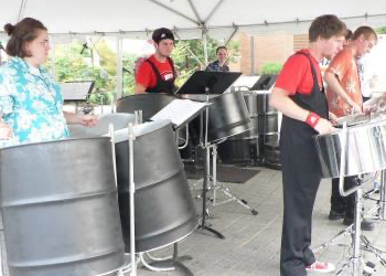 Group playing steel instruments.