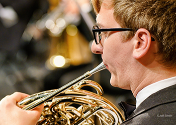 Man Playing French Horn