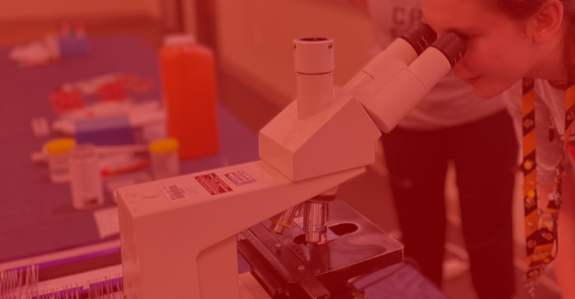 Student with microscope