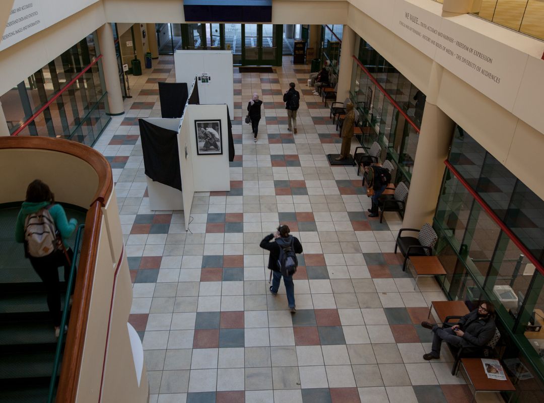 students walking in mass media