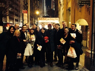 Students standing around Billy Porter at the stage door