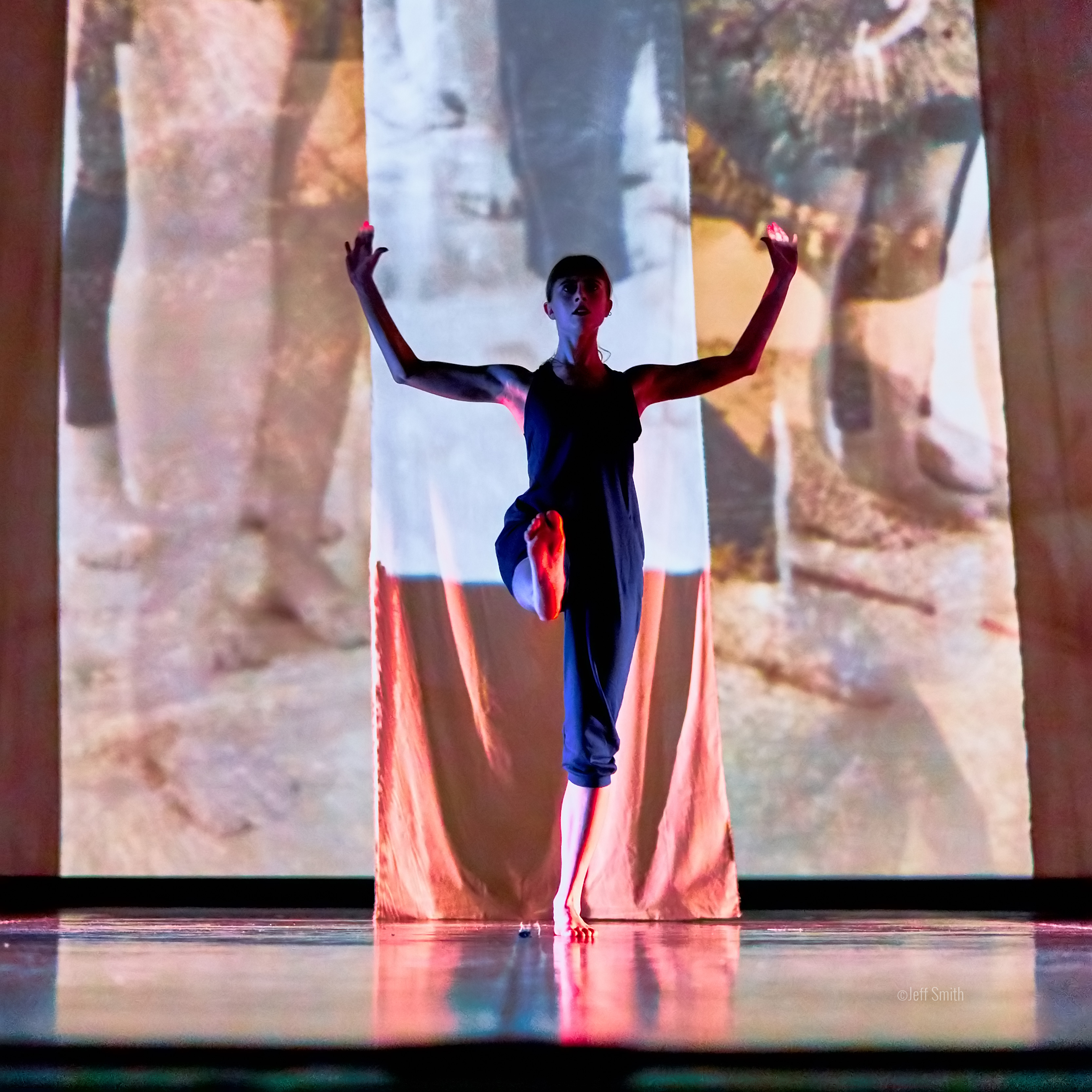 Woman and man dancing in front of bright background