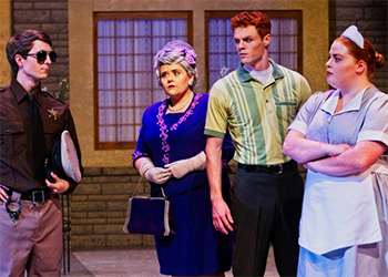 Four people acting in Tartuffe.