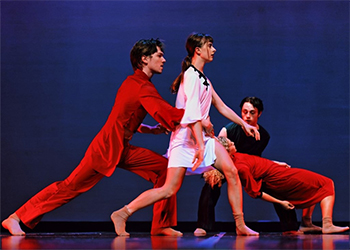 Two women and two men danceing.