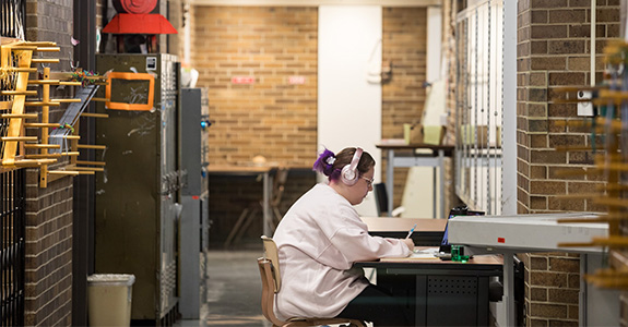 Rebecca Jury, UX student, studying in the Fine Arts Center