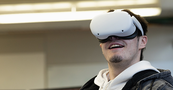 Student wears a VR headset.
