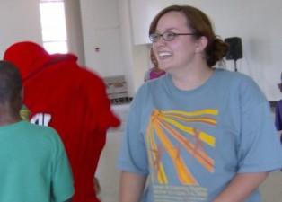 Nik Mabry playing with big red and kids